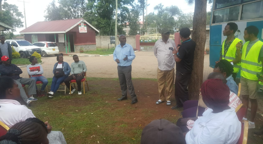 London Ward in Nakuru - Dr. S. Muketha, Eng. James Murimi and area Chief J. Mburu addresses the Local Community during the Focus Group Discussion (FCD)