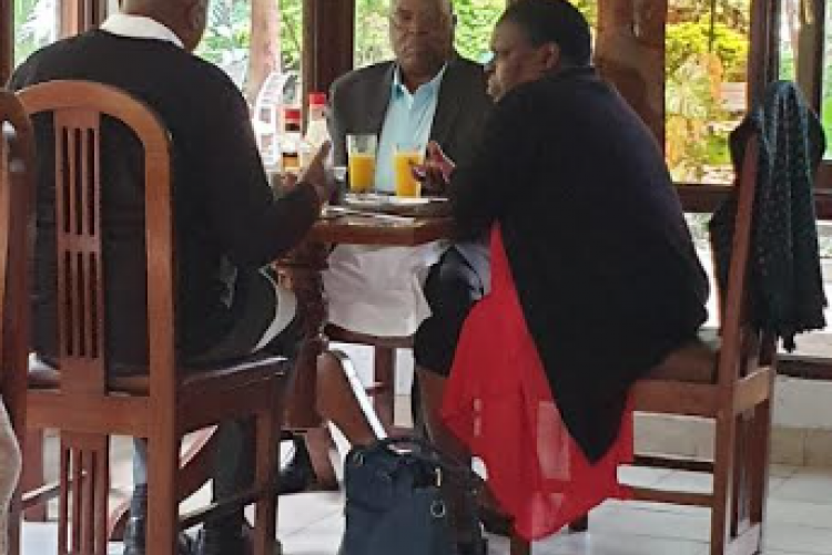 Dr. Munyua Mwaura, Dr. Fridah and Dr. Stephen Mugo during Team Building Luncheon