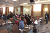 Prof. Karanja Mwangi presenting his paper at workshop venue to attentive participants 